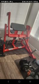 Used Plate Loaded Commercial Curl Machine (Hammer Strength Replica) Red